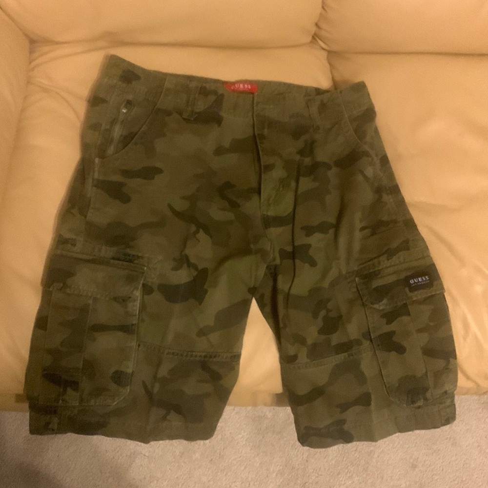 Pair of Guess camouflage shorts. Size 34. Retail 45.00 will sell for 20.00